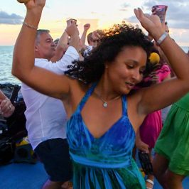 a group of people that are standing in the water